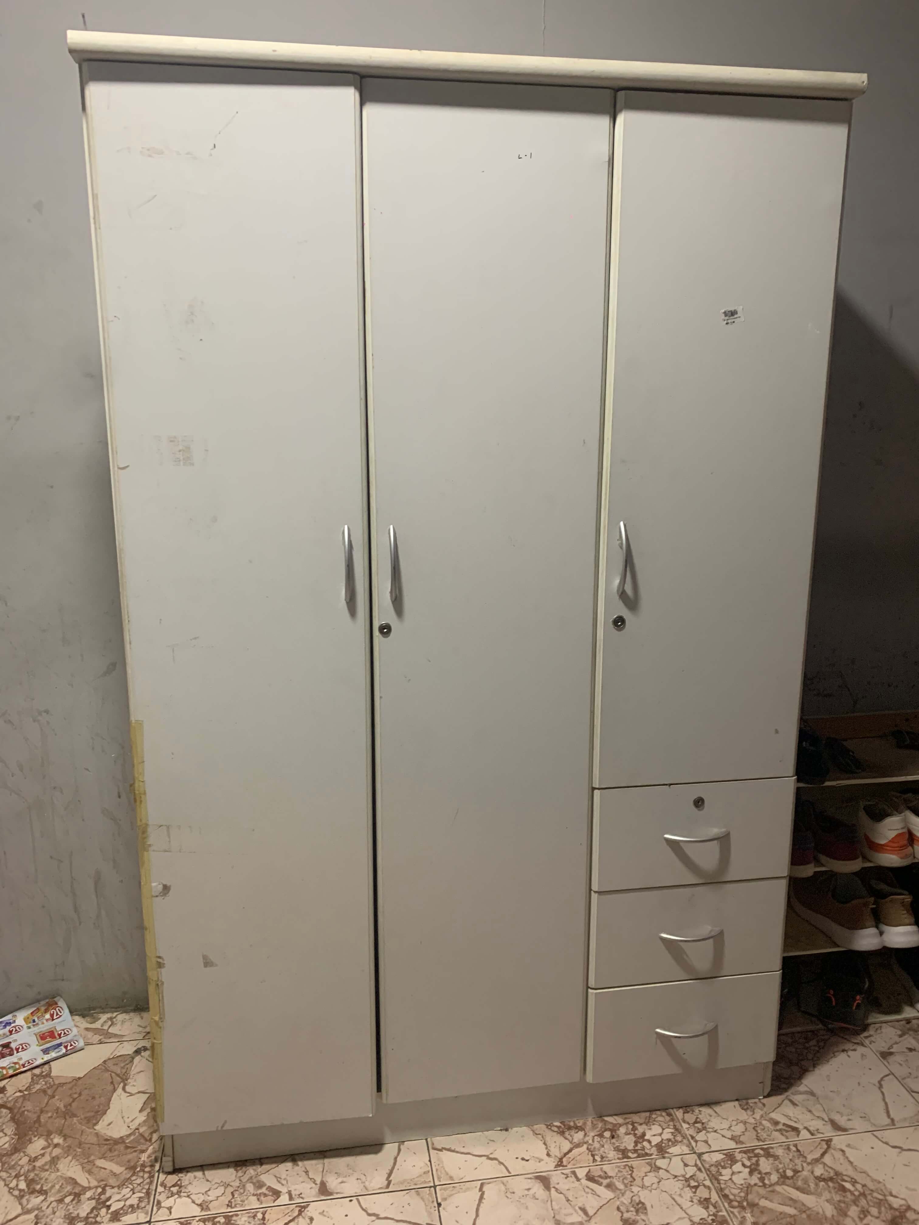 Large white 3 door closet