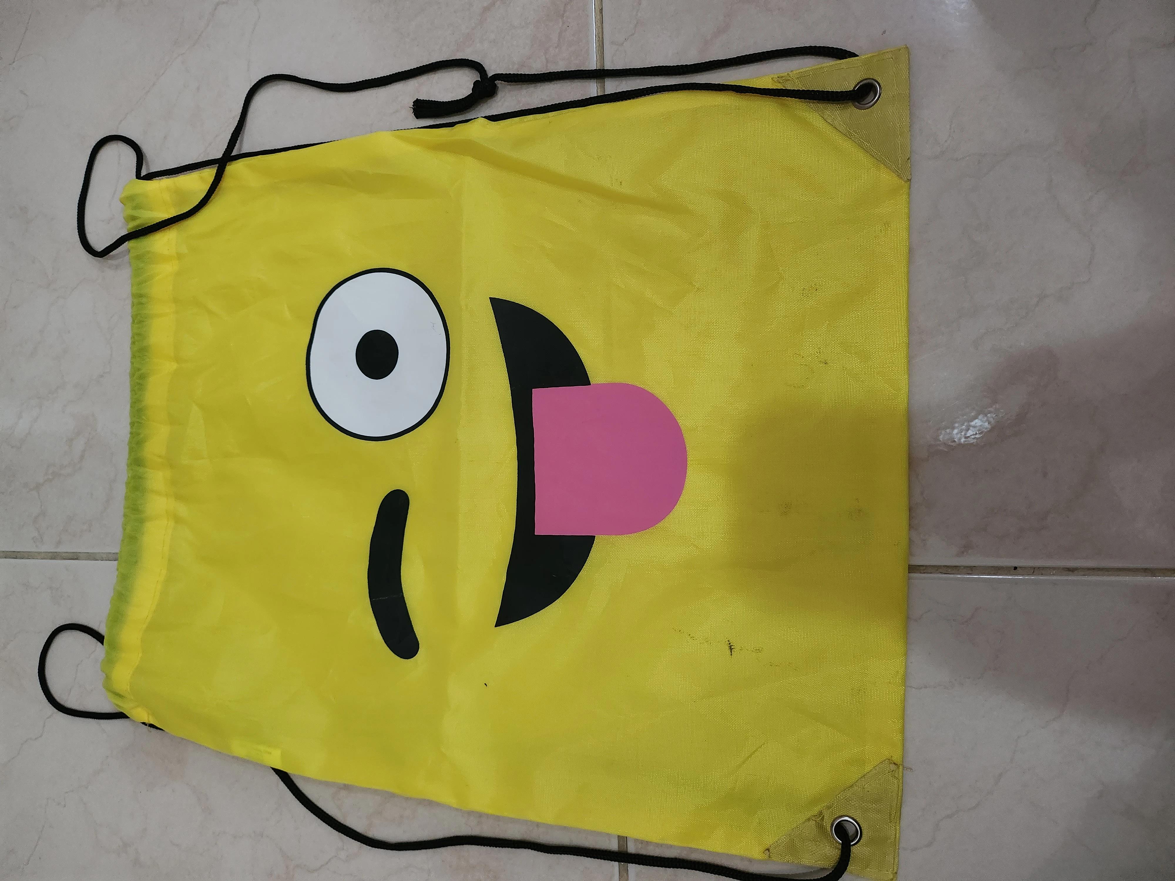 Yellow emoji bag