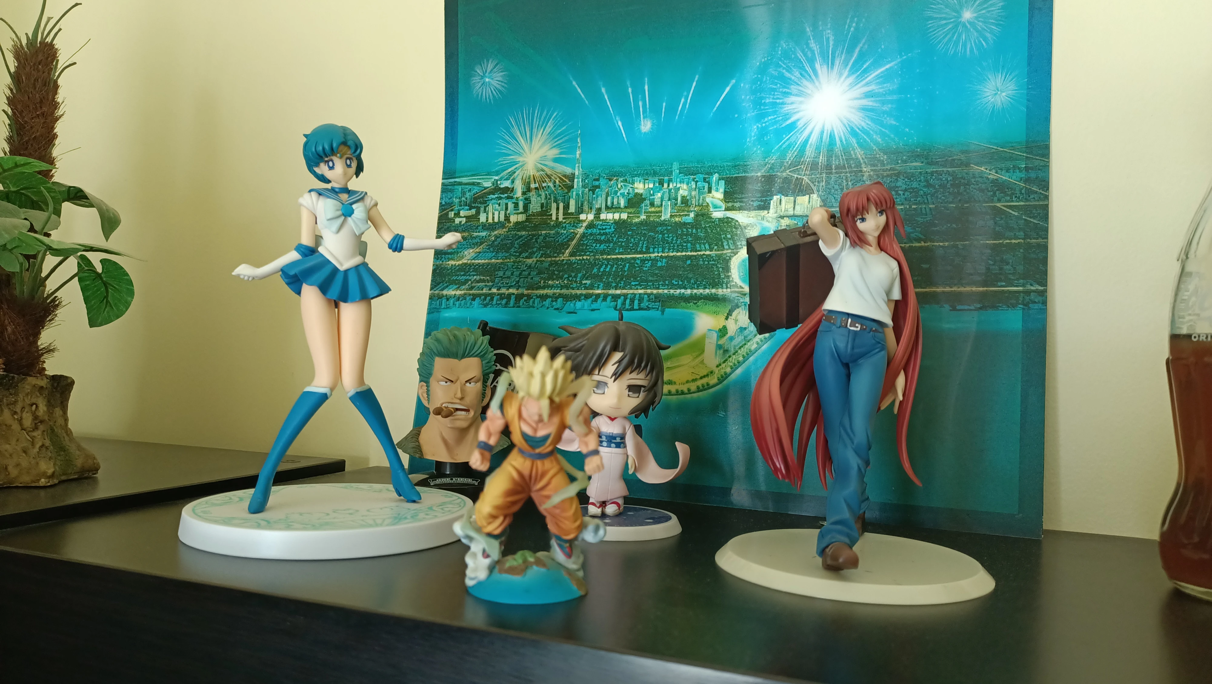 Collection of Action Figures and Souvenirs